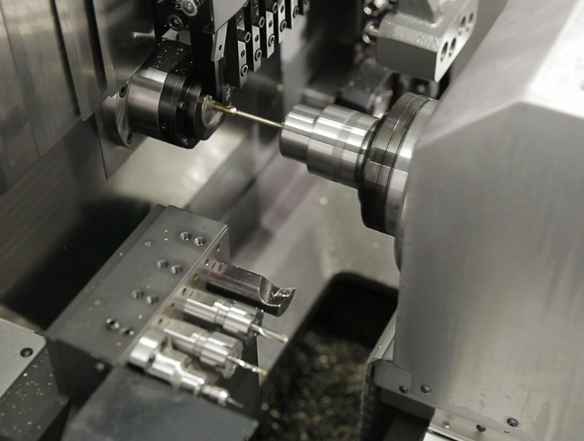 Torno CNC tipo suizo Polygim de cabezal movil
